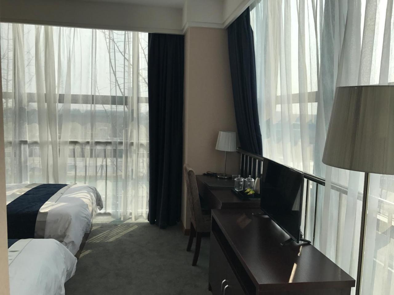 Hubei Airport Business Hotel Tianhe Airport Branch Ухан Екстериор снимка